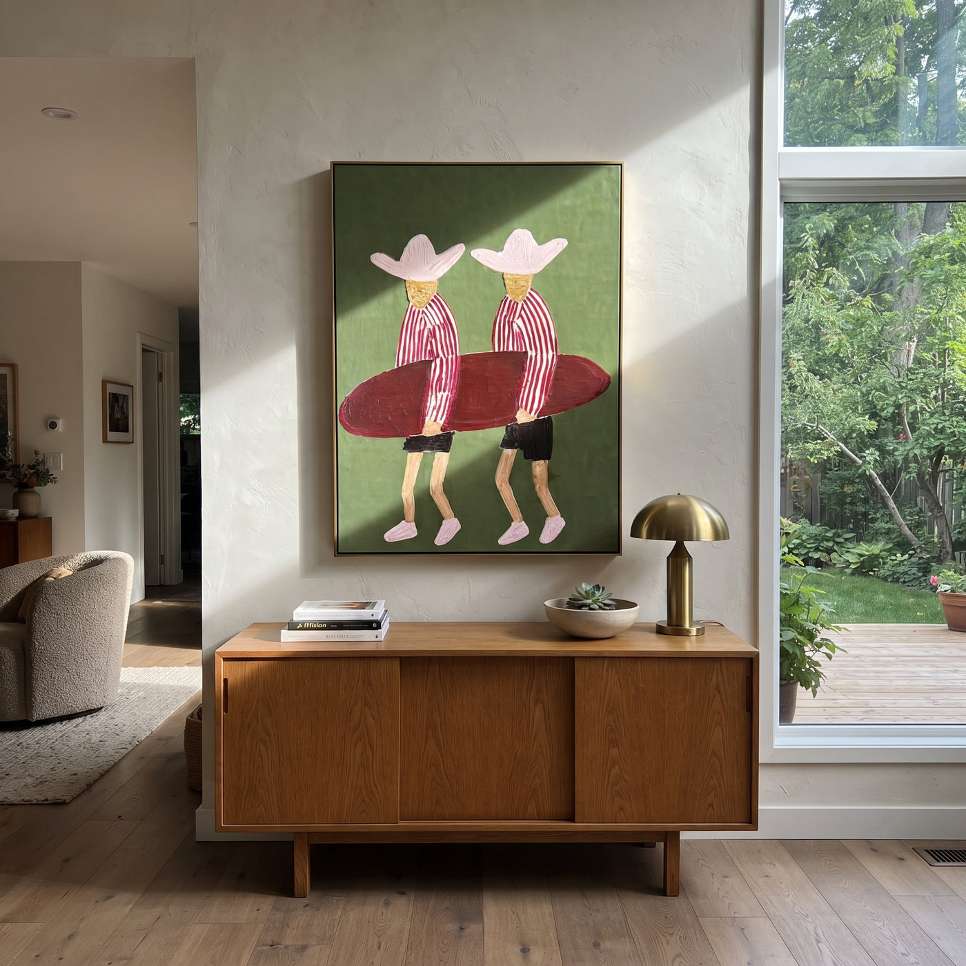 Twin Hats Carry Burgundy - surfboard figure pair painting by Claire Whitmore, modern coastal vertical wall art – styled room scene view 1