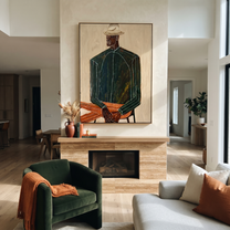 Green Suit Waits Seated – Seated Green Suit Figure painting by Adrian Lee, mid-century modern vertical wall art – styled room scene view 3