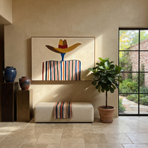 Brown Brim Floats Ivory – Wide Hat Stripe Figure painting by Adrian Lee, mid-century modern horizontal wall art – styled room scene view 2