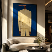 Cream Figure Meets Blue – Cream Portrait Blue Ground painting by Adrian Lee, mid-century modern vertical wall art – styled room scene view 1