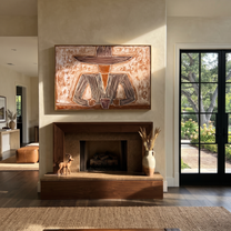 Two Cups Hold the Earth - Rustic Hat Figure with Cups painting by Adrian Lee, mid-century modern horizontal wall art – styled room scene view 1