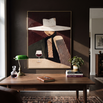 White Brim Keeps the Wine - Wide Hat Wine Figure painting by Adrian Lee, mid-century modern vertical wall art – styled room scene view 5