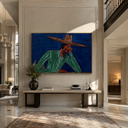 Cobalt Thought Rests Green - Reclining Green Hat Figure painting by Adrian Lee, mid-century modern horizontal wall art – styled room scene view 1
