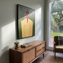 Golden Robe Holds Moss - Gold Robe Portrait painting by Adrian Lee, mid-century modern vertical wall art – styled room scene view 5