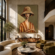 Clay Hat Holds Quiet Hands - Clay Stripe Woman Portrait painting by Adrian Lee, mid-century modern vertical wall art – styled room scene view 1