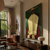Ivory Robe Takes the Red Chair - Seated Ivory Robe Figure painting by Adrian Lee, mid-century modern vertical wall art – styled room scene view 5