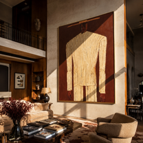 Ivory Column Rises from Brown - Tall Ivory Suit Figure painting by Adrian Lee, mid-century modern vertical wall art – styled room scene view 1