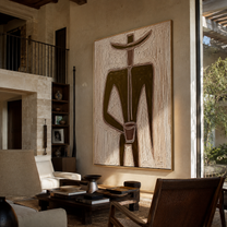 Olive Geometry Holds a Cup - Geometric Olive Hat Figure painting by Adrian Lee, mid-century modern vertical wall art – styled room scene view 1