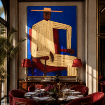 Ivory Angles Sit in Cobalt - Seated Ivory Suit Figure painting by Adrian Lee, mid-century modern vertical wall art – styled room scene view 3