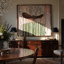 Green Stripes Stand in Rain - Green Stripe Wide Hat Figure painting by Adrian Lee, mid-century modern square wall art – styled room scene view 2