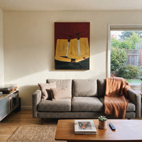 Ivory Shoulders Lean Together - ivory seated figure pair painting by Adrian Lee, mid-century modern vertical wall art – styled room scene view 2