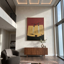 Ivory Shoulders Lean Together - ivory seated figure pair painting by Adrian Lee, mid-century modern vertical wall art – styled room scene view 5