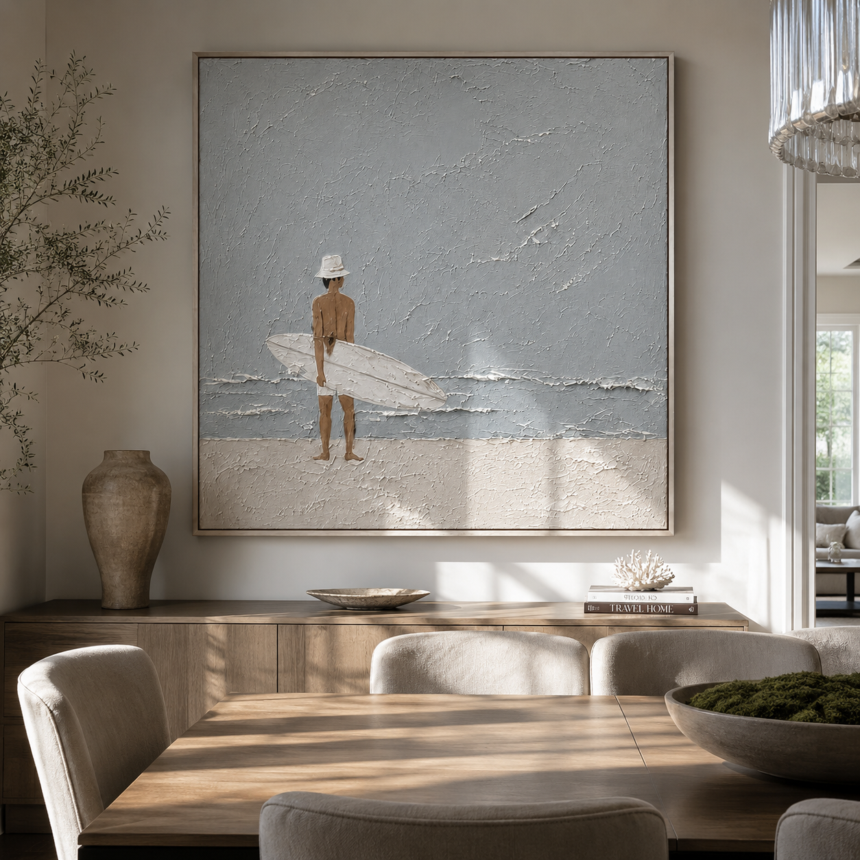 Quiet Surf Finds the Gray Sky - Minimal Surfer on Pale Beach painting by Claire Whitmore, modern coastal square wall art – styled room scene view 1
