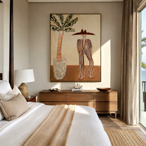 Striped Heat Stands by the Palm - Resort Figure with Broad Hat painting by Claire Whitmore, modern coastal vertical wall art – styled room scene view 1