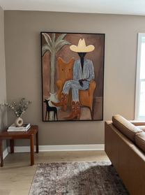 Striped Cowboy Keeps Watch - striped cowboy with dog painting by Claire Whitmore, modern coastal vertical wall art – styled room scene view 9