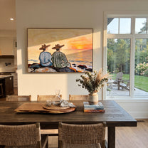Sunset Waits Behind Stripes - sunset coastal pair painting by Claire Whitmore, modern coastal horizontal wall art – styled room scene view 1