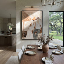 Stripes Lean Into Ivory - striped parasol couple painting by Claire Whitmore, modern coastal vertical wall art – styled room scene view 3