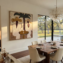 Palms Frame Quiet Toast - palm martini pair painting by Claire Whitmore, modern coastal square wall art – styled room scene view 3