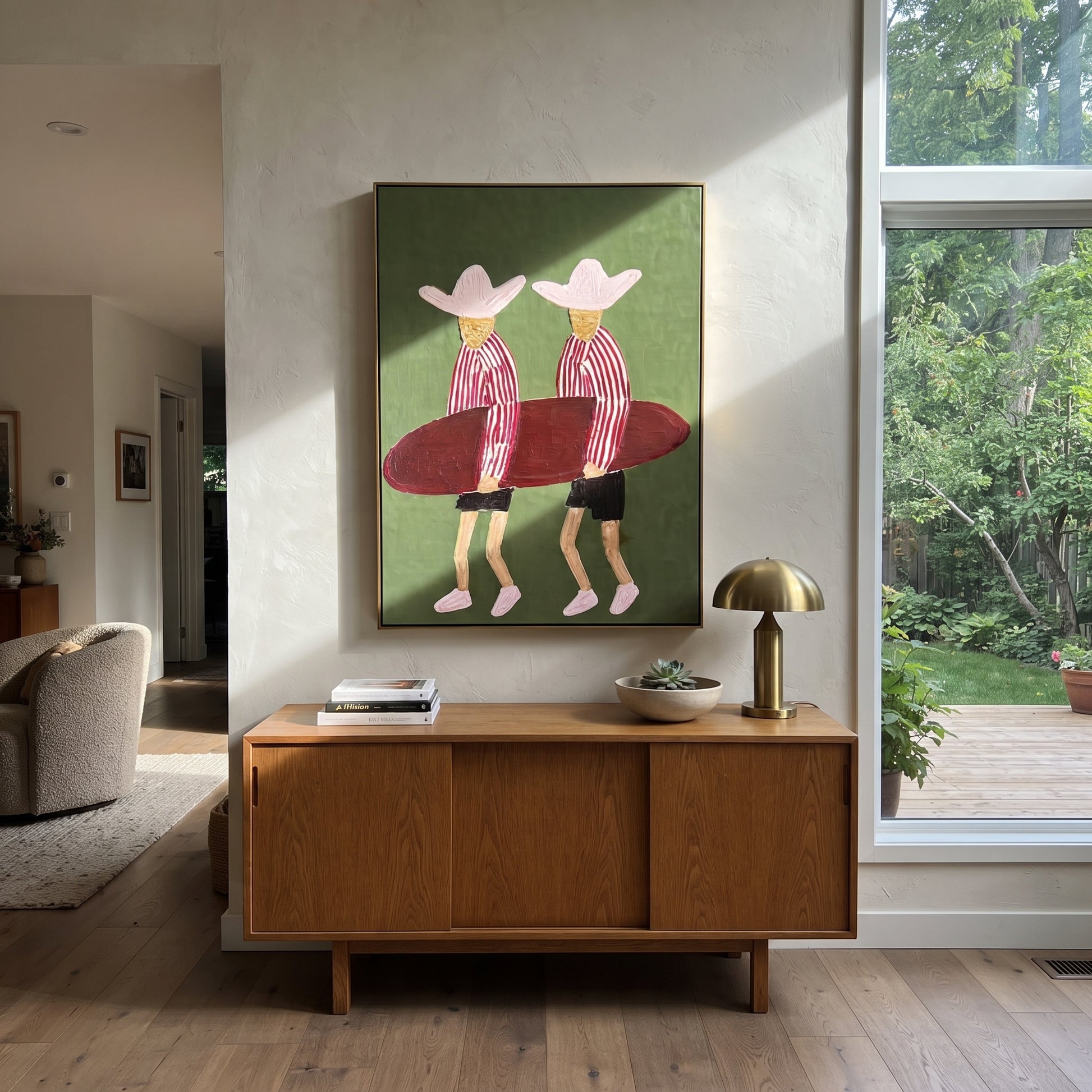 Twin Hats Carry Burgundy - surfboard figure pair painting by Claire Whitmore, modern coastal vertical wall art – styled room scene view 1