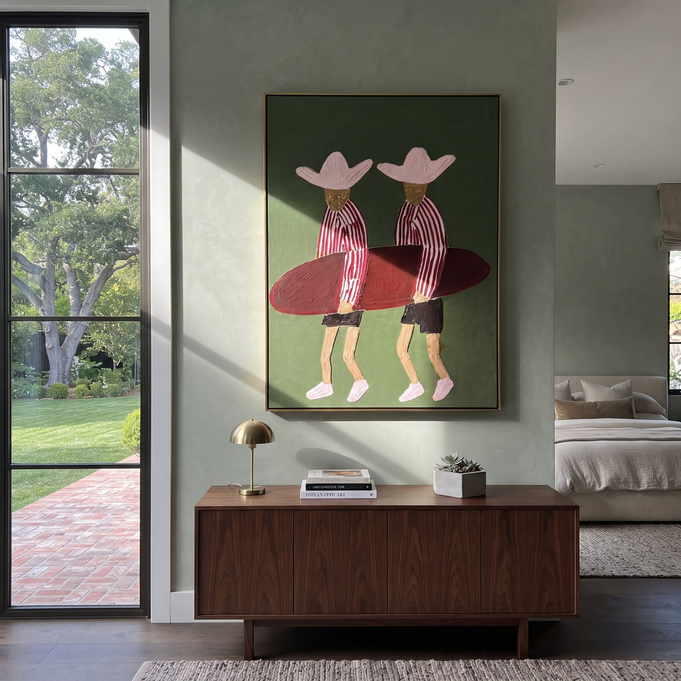 Twin Hats Carry Burgundy - surfboard figure pair painting by Claire Whitmore, modern coastal vertical wall art – styled room scene view 3