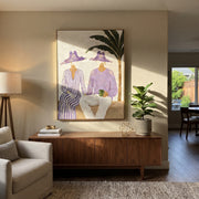 Purple Hats Share Coffee - purple hat coffee pair painting by Claire Whitmore, modern coastal vertical wall art – styled room scene view 1