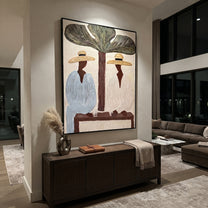 Tree Shade Divides Linen - tropical tree figure pair painting by Claire Whitmore, modern coastal vertical wall art – styled room scene view 5
