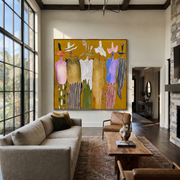 Feathered Hats Form a Chorus - colorful western figures painting by Savannah Reed, modern folk art square wall art – styled room scene view 1