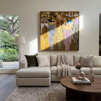 Feathered Hats Find Company - feathered western figures painting by Savannah Reed, modern folk art square wall art – styled room scene view 1