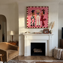 Three Cowgirls Claim Pink - three cowgirls on pink painting by Savannah Reed, modern folk art square wall art – styled room scene view 3