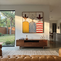Three Hats Face Away - striped cowboy figures painting by Savannah Reed, modern folk art square wall art – styled room scene view 1