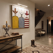 Three Hats Face Away - striped cowboy figures painting by Savannah Reed, modern folk art square wall art – styled room scene view 5