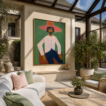 Rose Brim Holds the Green Room - seated pink cowboy painting by Savannah Reed, modern folk art vertical wall art – styled room scene view 2