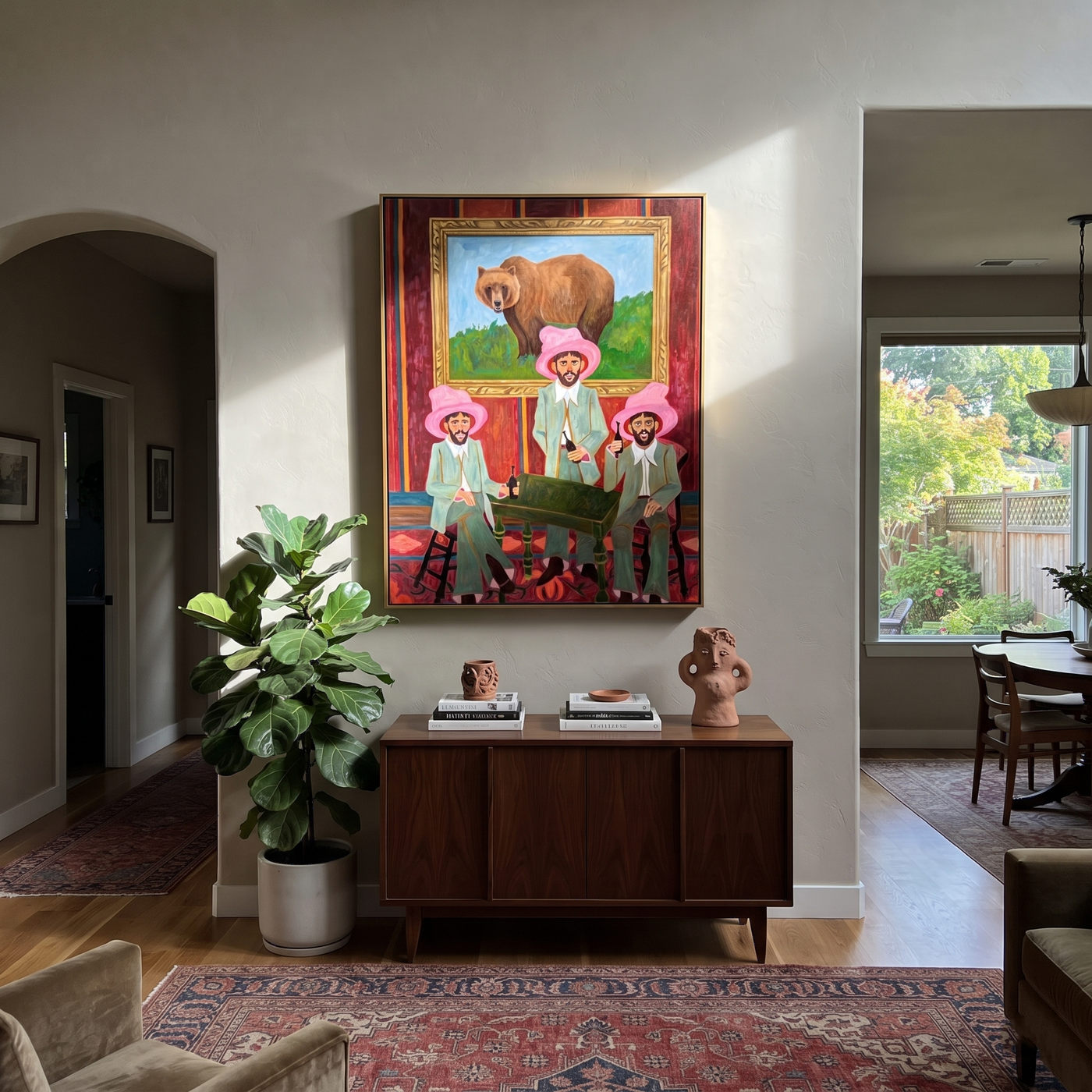 Bear Watches Pink Company - three cowboys and bear painting by Savannah Reed, modern folk art vertical wall art – styled room scene view 3