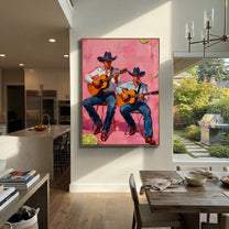 Two Guitars Warm Pink - cowboy guitar duet painting by Savannah Reed, modern folk art vertical wall art – styled room scene view 2