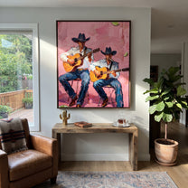 Two Guitars Warm Pink - cowboy guitar duet painting by Savannah Reed, modern folk art vertical wall art – styled room scene view 4