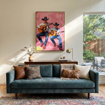 Two Guitars Warm Pink - cowboy guitar duet painting by Savannah Reed, modern folk art vertical wall art – styled room scene view 5