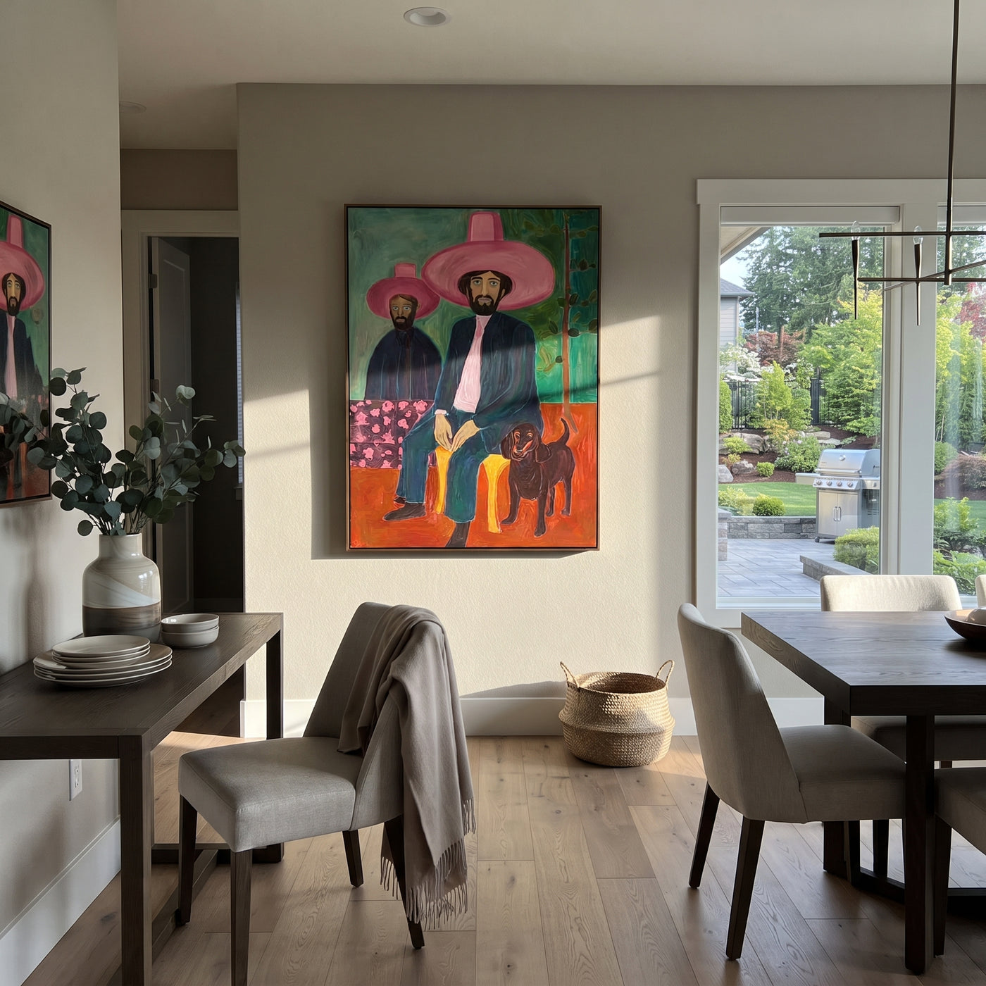 Black Dog Guards Pink - cowboy dog portrait painting by Savannah Reed, modern folk art vertical wall art – styled room scene view 1