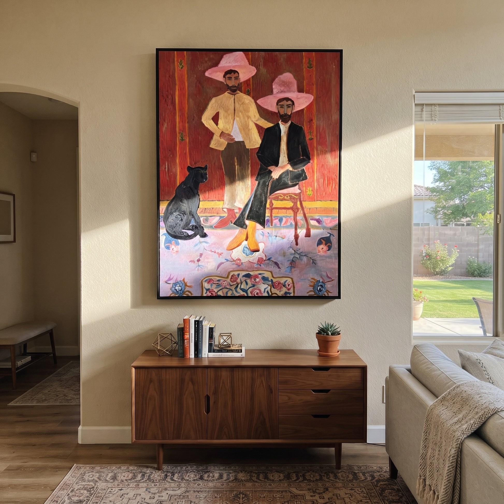 Pink Hats Keep Company - cowboy dog interior painting by Savannah Reed, modern folk art vertical wall art – styled room scene view 1