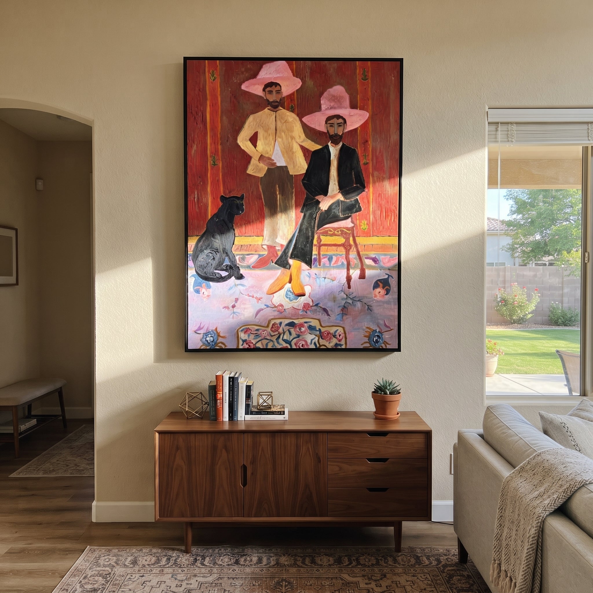 Pink Hats Keep Company - cowboy dog interior painting by Savannah Reed, modern folk art vertical wall art – styled room scene view 1