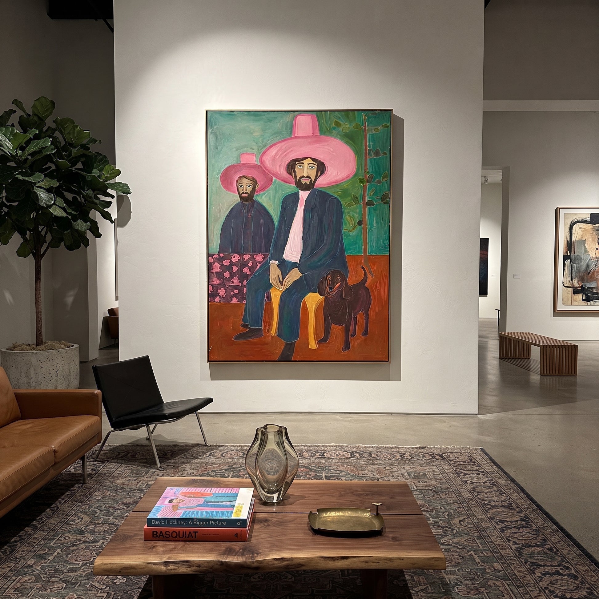 Pink Brims Shelter Hound - pink hat cowboy painting by Savannah Reed, modern folk art vertical wall art – styled room scene view 5