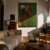 Pink Brim Raises Thunder – Pink Hat Rider and Rearing Horse painting by Isabelle Laurent, modern Western vertical wall art – styled room scene view 5