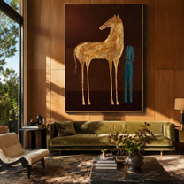 Gold Horse Waits – Golden Horse and Blue Figure painting by Isabelle Laurent, modern Western vertical wall art – styled room scene view 5