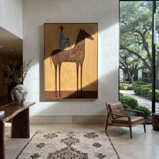 Painted Saddle Hold the Horizon - horse and rider painting by Isabelle Laurent, modern Western vertical wall art – styled room scene view 1