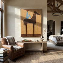 Painted Saddle Hold the Horizon - horse and rider painting by Isabelle Laurent, modern Western vertical wall art – styled room scene view 5