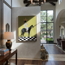 Wild Grace Hold the Horizon - horse and rider painting by Isabelle Laurent, modern Western vertical wall art – styled room scene view 1