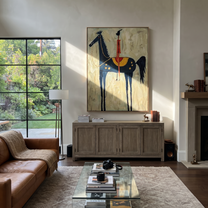 Western Stars Cross the Quiet Field - horse and rider painting by Isabelle Laurent, modern Western vertical wall art – styled room scene view 1
