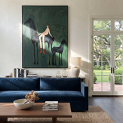 Wild Grace Wait beneath the Stars - horse and rider painting by Isabelle Laurent, modern Western vertical wall art – styled room scene view 1