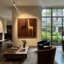 Desert Rhythm Carry the Morning - two horse painting by Isabelle Laurent, modern Western square wall art – styled room scene view 3