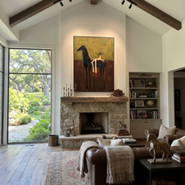 Amber Trail Meet the Open Sky - figure and horse painting by Isabelle Laurent, modern Western vertical wall art – styled room scene view 4