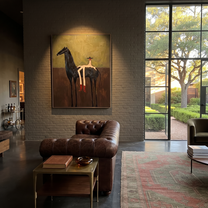 Amber Trail Meet the Open Sky - figure and horse painting by Isabelle Laurent, modern Western vertical wall art – styled room scene view 5